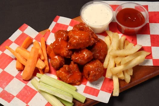 buffalo chicken wings with celery sticks